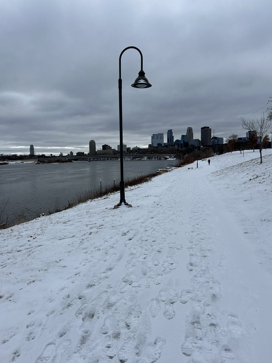 corinhoggard's tweet photo. The last #HogJog of 2023 was the first truly snowy time to #RunTheRiver.
The trails are beautiful, but a bit of a slog.
Even Stone Arch Bridge was covered in caked snow, but St. Anthony Falls is flowing fast and I saw a lot of dogs enjoying the new terrain. https://t.co/aI16jcilBO