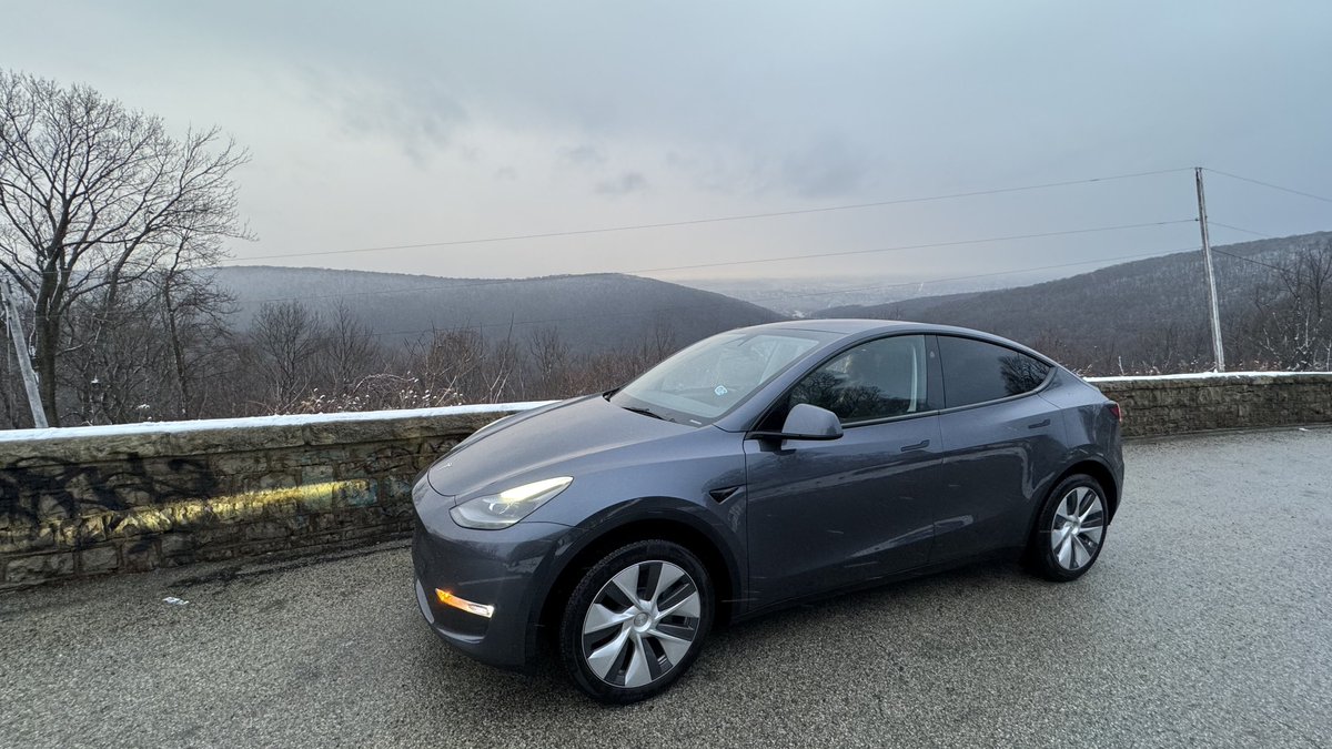 BoilerPaulie's tweet photo. Our first road trip in the new car is going pretty well so far - started at 8 am and we are 2 hours away from our destination in Virginia after going through some fairly heavy snow conditions in the mountains for the past hour or so. But there was a nice scenic lookout to turn off at before that, where someone had made a tiny snowman.