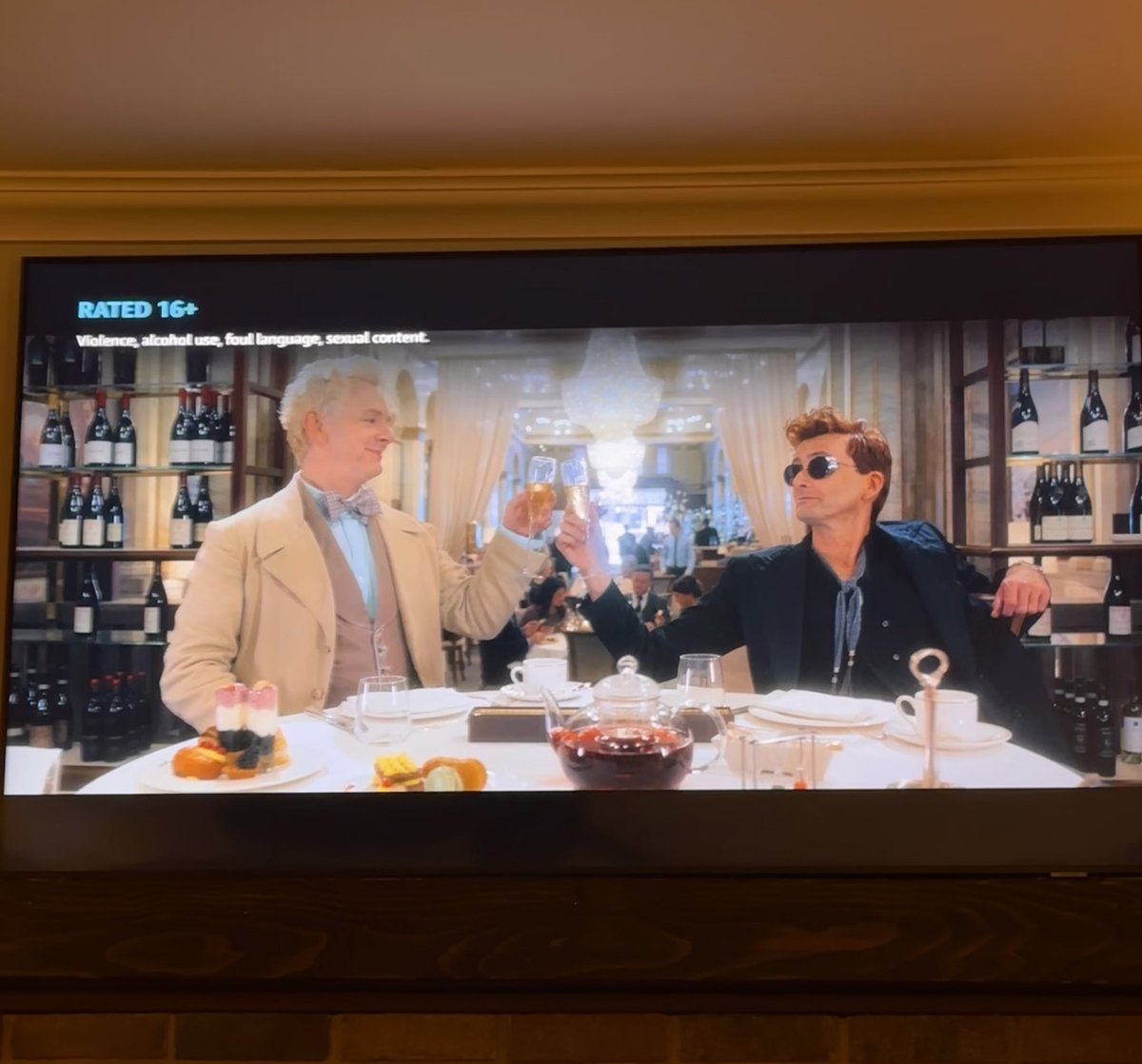 MarieJackline's tweet photo. If you start @GoodOmensPrime S1E6 at 11:08:33 pm, you will toast to 2024 with #Aziraphale and #Crowley at The Ritz. 🥲🪽🐍 #ToTheWorld https://t.co/nBJuGsu6u2