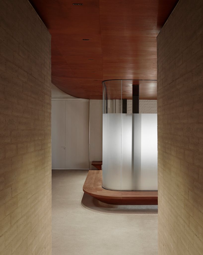 designboom's tweet image. delordinaire imbues #redwood curves &amp;amp; raw earth #bricks into @RouchonParis' production studio