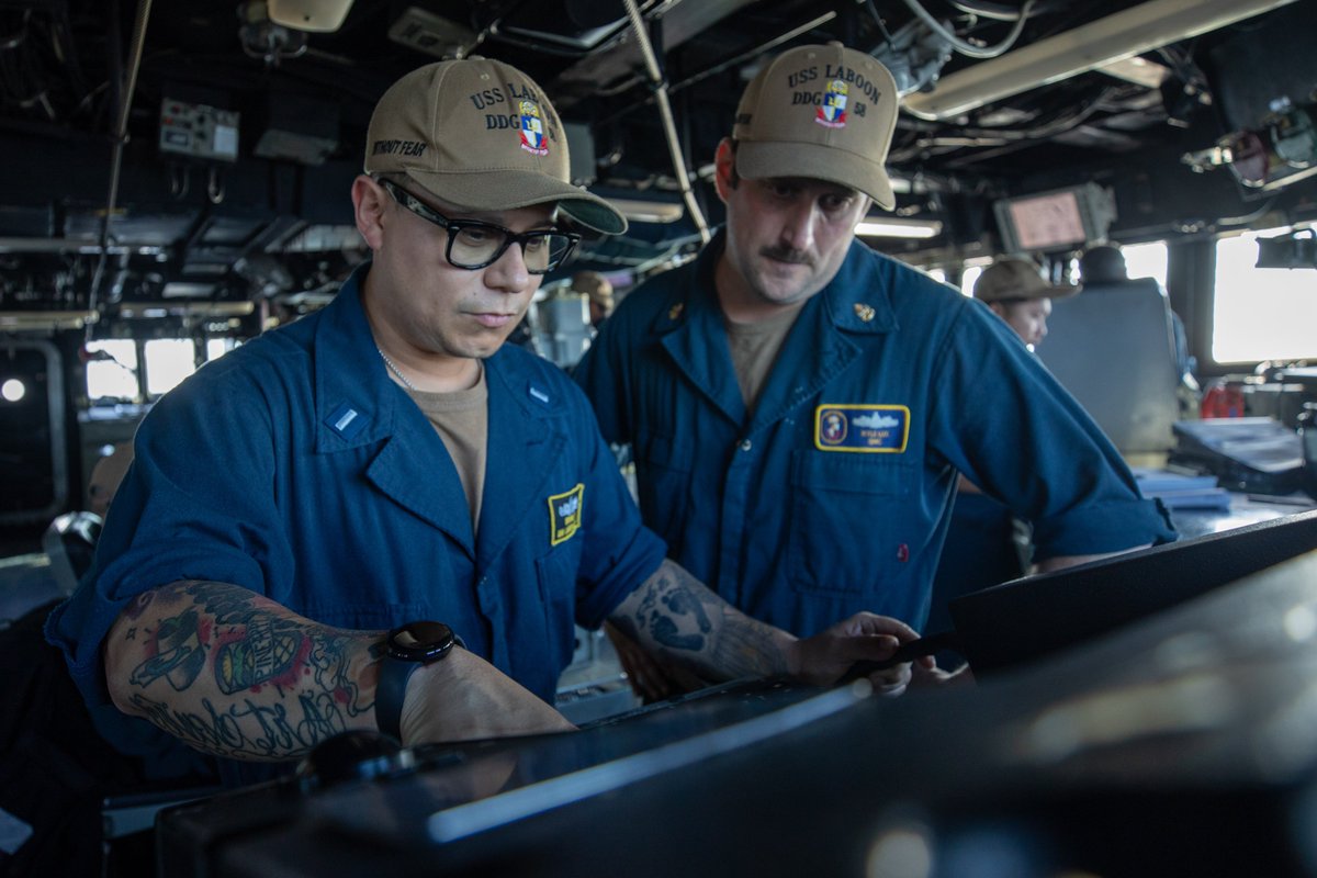 U.S. Navy and Coast Guard officers aboard USS Laboon chart a course in support of Operation Prosperity Guardian. Navy officers and a chief monitor contacts. Led by Combined Task Force 153 of the Combined Maritime Forces, Operation Prosperity Guardian represents a focused,…