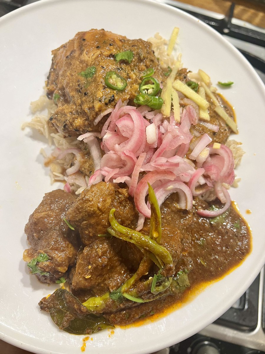 hassinator's tweet photo. about last night. a lovely feast with pork shoulder vindaloo and butter chicken followed by #KitchenRave no run for johnny gift but saw new year in with a bang. it canโt be as bad as 23, right? https://t.co/aSfgid29Ry