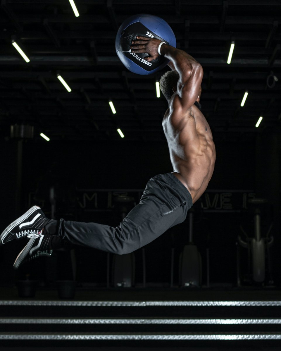 Soaring to new heights, he harnesses power with every jump and medicine ball slam. Witness the dynamic energy in each lift. What's your go-to explosive workout? Share your favorites! #MedicineBallJump #PowerfulWorkouts #RomixFitness