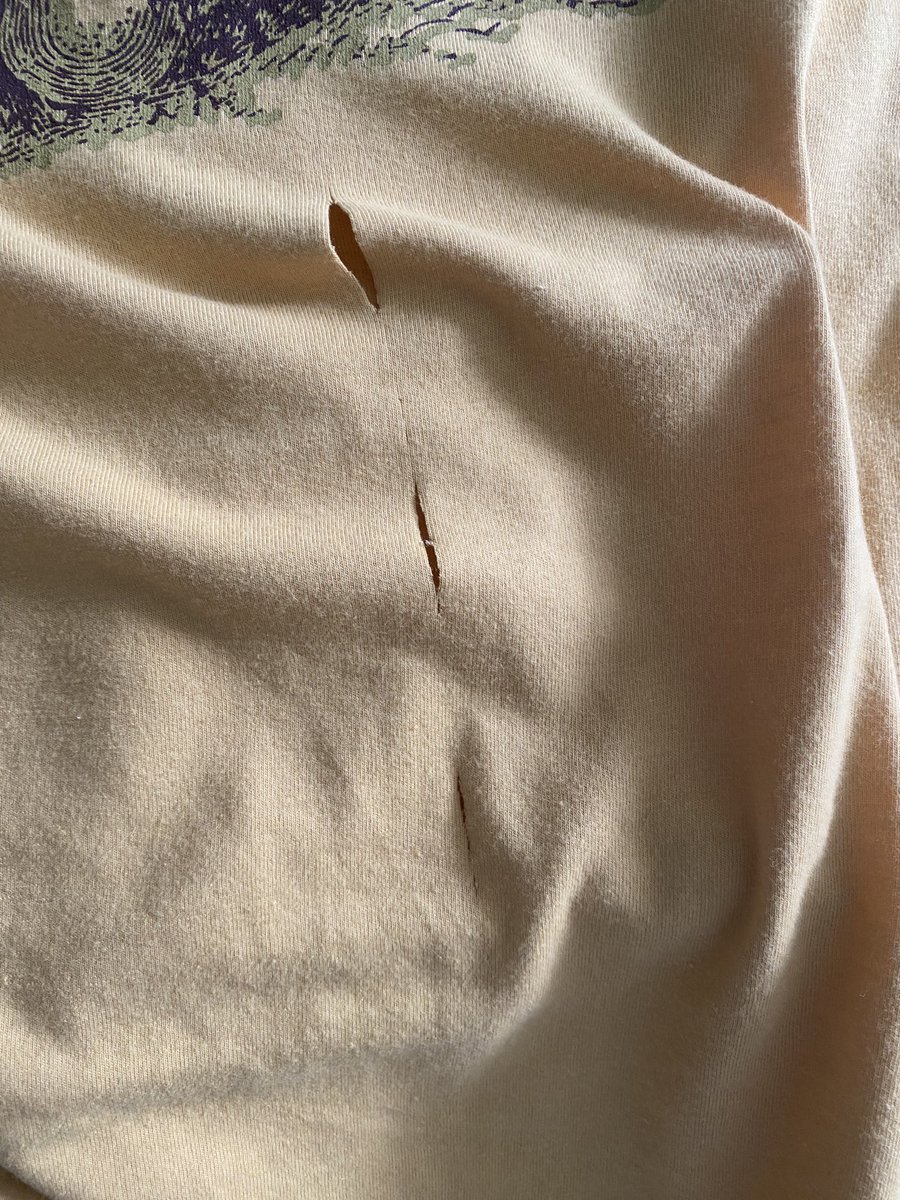 MrsSumners's tweet photo. @AskTarget @Target Bought my husband a special shirt for Christmas when we were visiting Texas. He opened it today to find a slash down the front! How do I get a replacement? HELP! https://t.co/7eq1XjNhKg