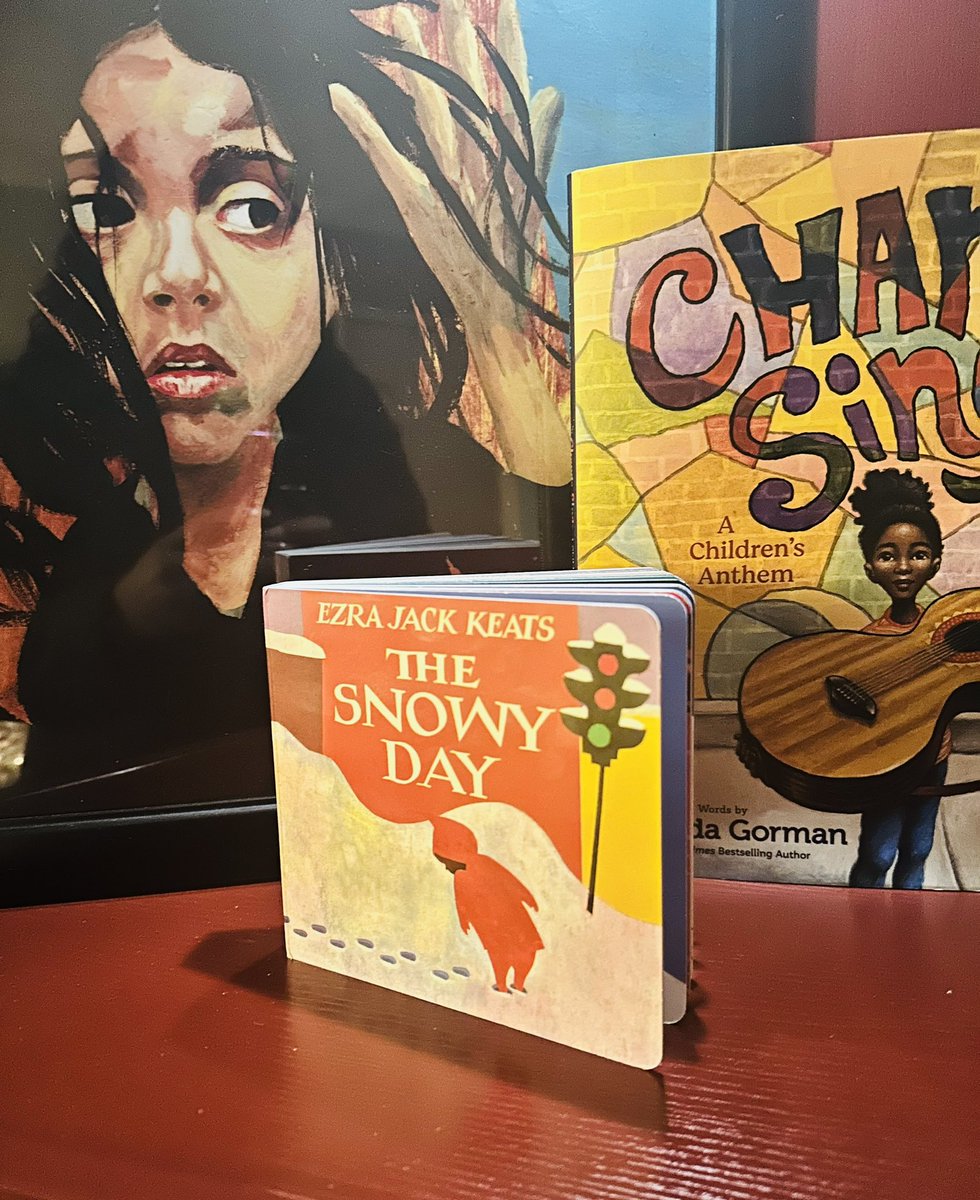 I was gifted the classic #TheSnowyDay for Christmas! I placed it next to my copy of an illustration by children’s book author and illustrator R. Gregory Christie and Change Sings by Amanda Gorman. ❤️