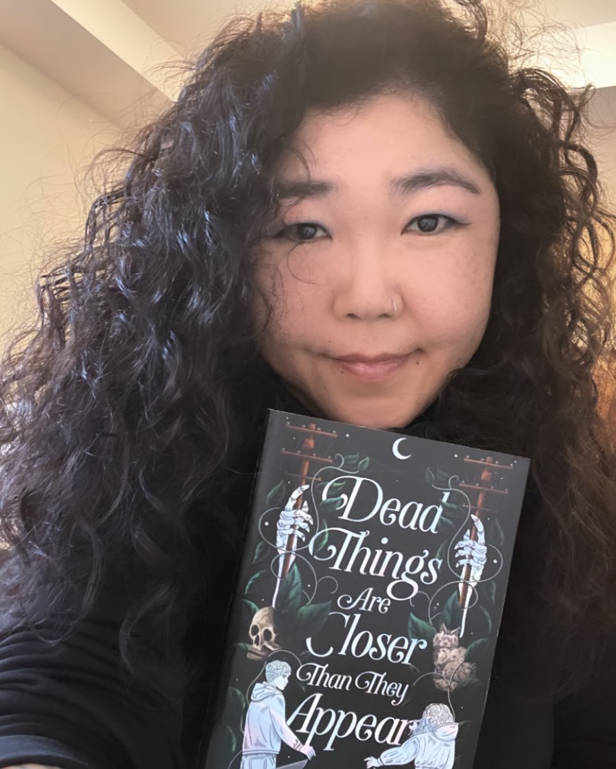 It is ✨2024✨ and officially my debut year... I present the rare photo that doesn't feature some kind of food. Dead Things Are Closer Than They Appear comes out this year... DEAD THINGS ARE CLOSER THAN THEY APPEAR COMES OUT IN SIX WEEKS. I'm excited!* *I am literally terrified.