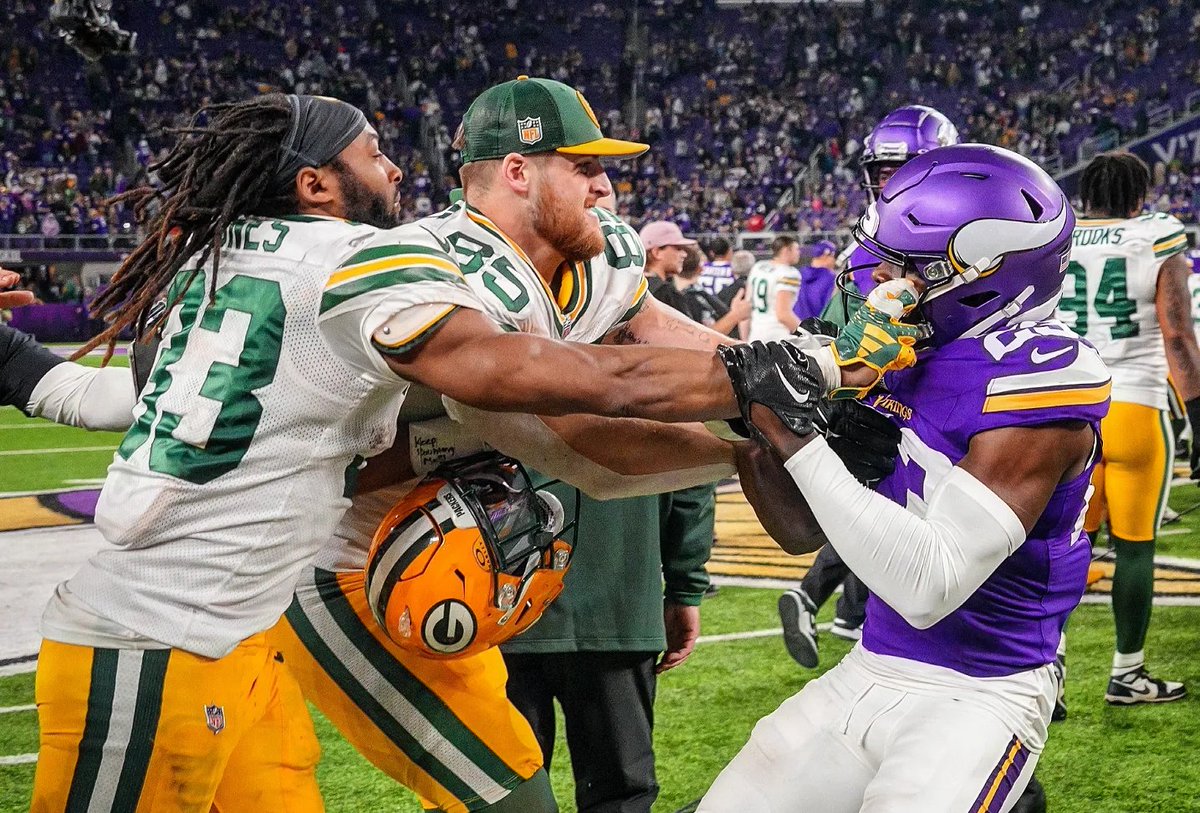 #Packers Aaron Jones and #Vikings Andrew Booth Jr getting after it post game. 👀