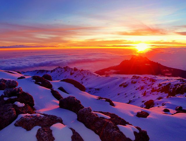 IMAGE: The sunset over the summit of Mt. Kilimanjaro in Tanzania