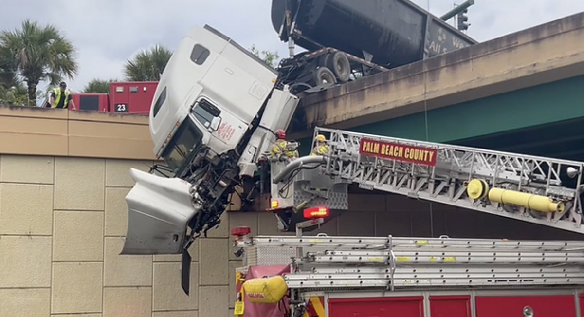 yardsticknews's tweet photo. @PBCFR firefighters save trapped truck dangling from overpass: Miraculous rescue caught on cam ➡️ https://t.co/VUlt14aatN

#trucknews #truck #trucker #truckers  #truckindustry #semitruck 

Photo: @PBCFR https://t.co/YQlnRuR805