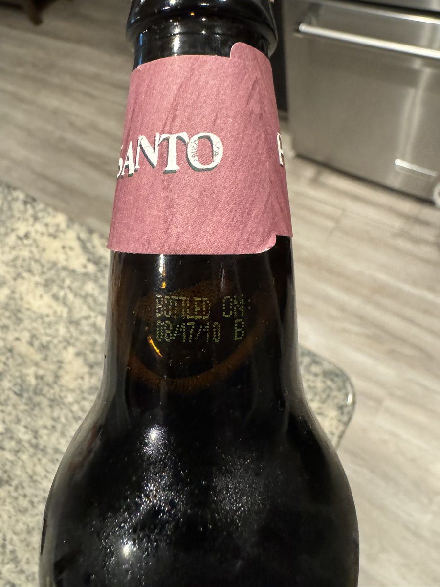 nucchemist's tweet photo. @dogfishbeer apparently I left this in my in-laws garage fridge 13 years ago. Thoughts on how it would taste now?!?!?! https://t.co/0J6FdAJSTj