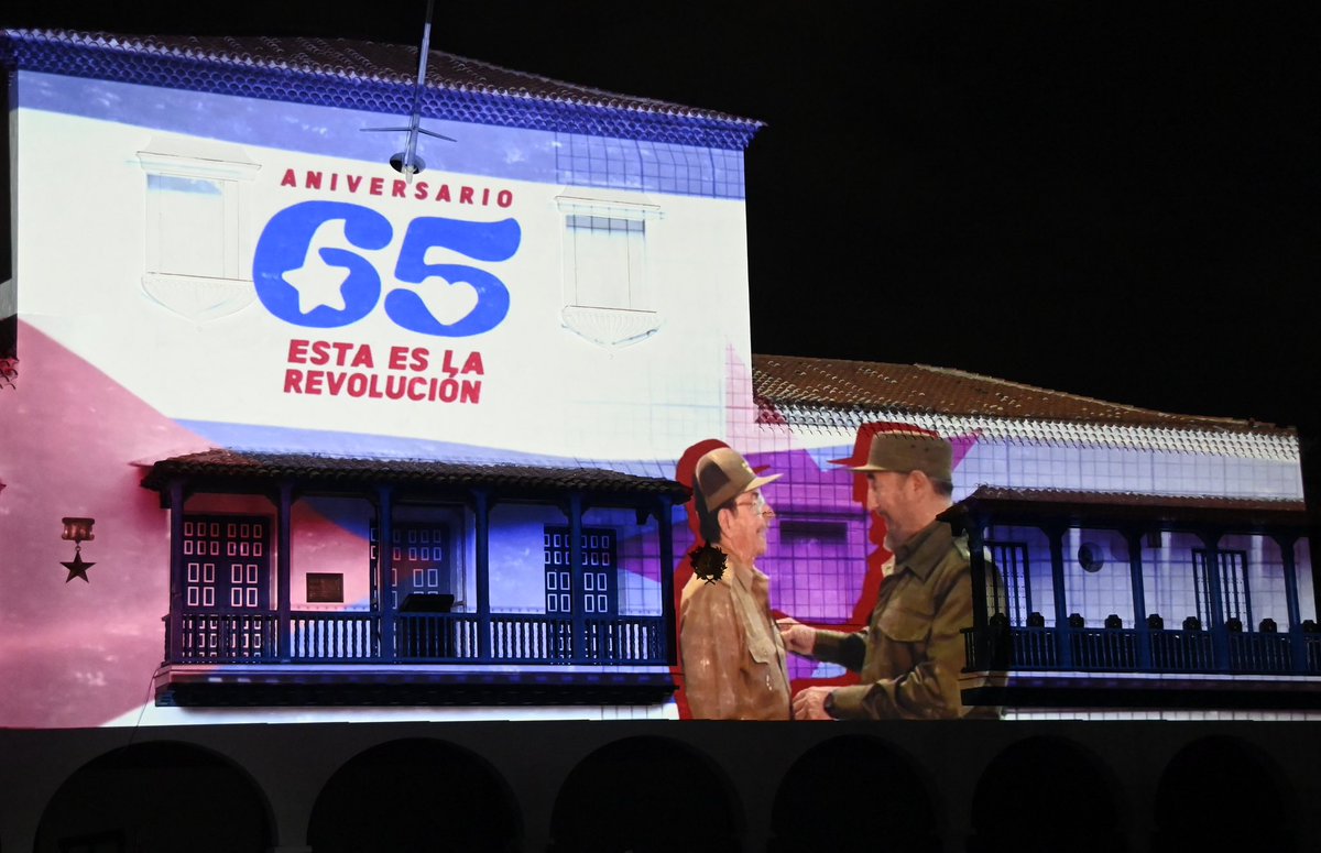 PresidenciaCuba's tweet photo. 🇨🇺| #Cuba celebra hoy el 65 aniversario de la Revolución. 

En la heroica Santiago de Cuba, y con la presencia del General de Ejército Raúl Castro Ruz y el presidente @DiazCanelB se honra a los héroes y mártires que liberaron a #Cuba para siempre.

#EstaEsLaRevolución ❤️ https://t.co/Xv6tzSaU0V