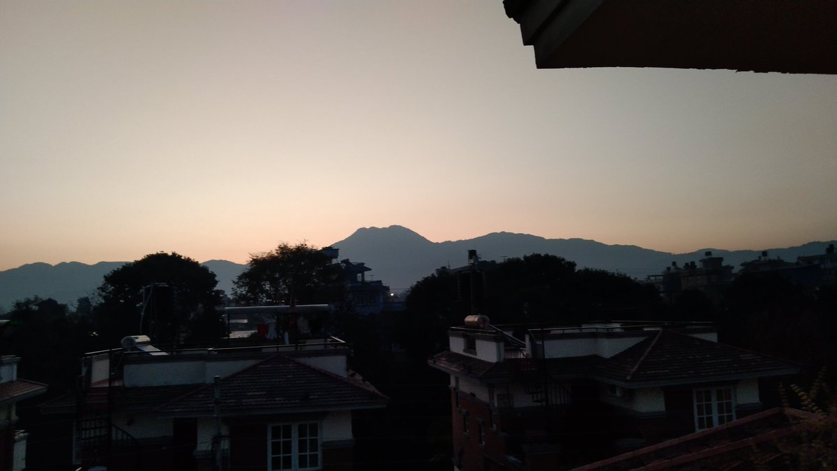 NamrataSharmaP's tweet photo. The first sun rays over #Chobar Hills the tallest in #Kathmandu valley seen from my terrace on Jan 1 good morning and #HappyNewYear2024 https://t.co/xtm6dPBuae
