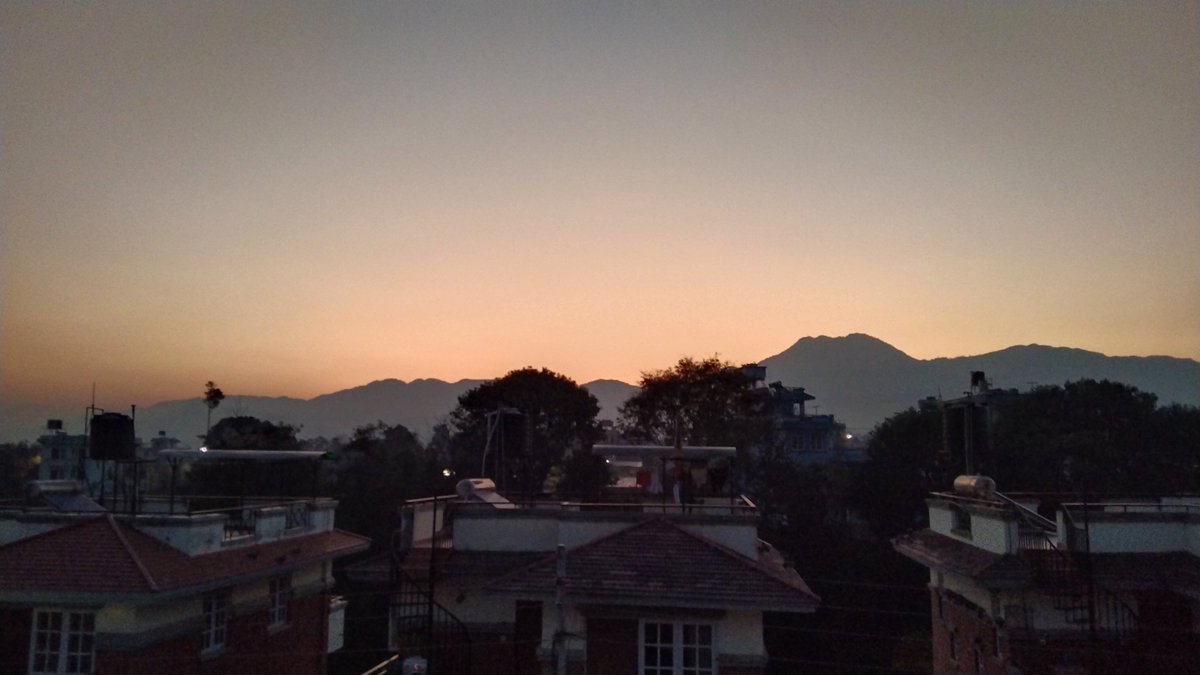 NamrataSharmaP's tweet photo. The first sun rays over #Chobar Hills the tallest in #Kathmandu valley seen from my terrace on Jan 1 good morning and #HappyNewYear2024 https://t.co/xtm6dPBuae