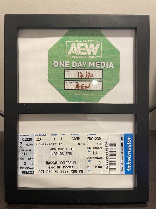 My wife just surprised me by giving me this.

She had it framed after we attended #AEWWorldsEnd, my first PPV ever, together and I participated in my first media scrum on Saturday, which meant a lot to me.

She's the best, and I'm so thankful.