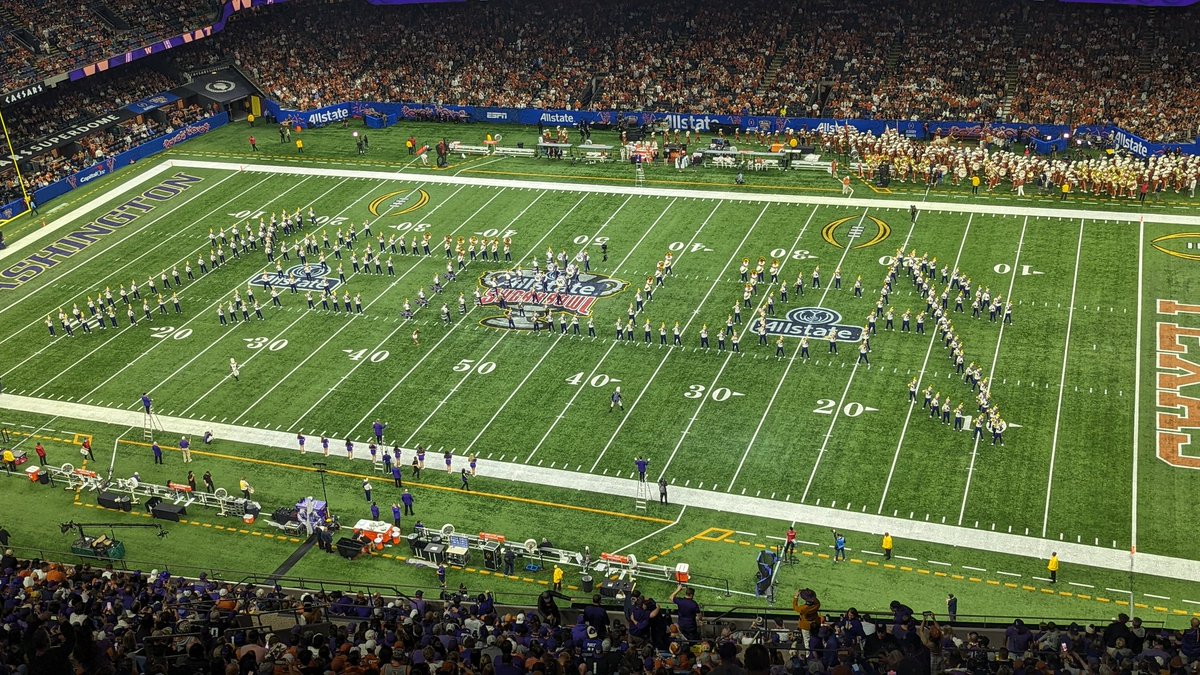 The Huskies band spells out Metallica, plays Enter Sandman because it was released in 1991 when the Dawgs won it all. #PurpleReign