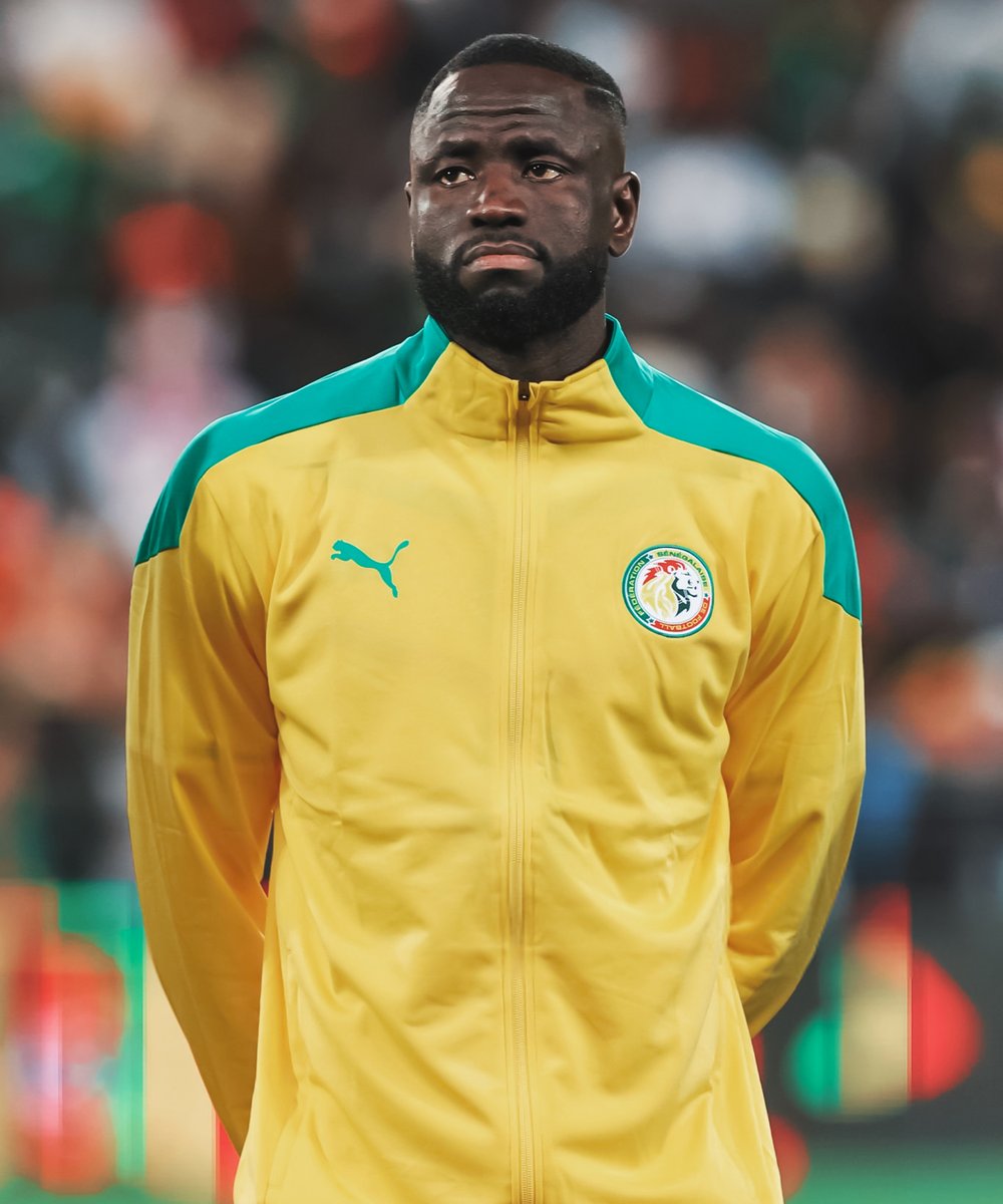 JoueursSN's tweet photo. Cheikhou Kouyaté a été autorisé à quitter le regroupement des lions suite au décès de son père ! Toutes nos condoléances à lui et sa famille. ❤️ https://t.co/OHeAWvDteO