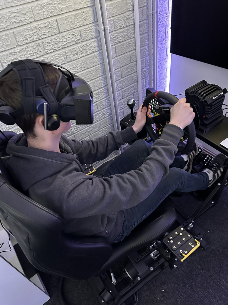 iconcitycom's tweet photo. The apprentice is getting to see what we get upto in the office @Leach_Rob #fanatec #motionrig #office https://t.co/JIlE8s18md