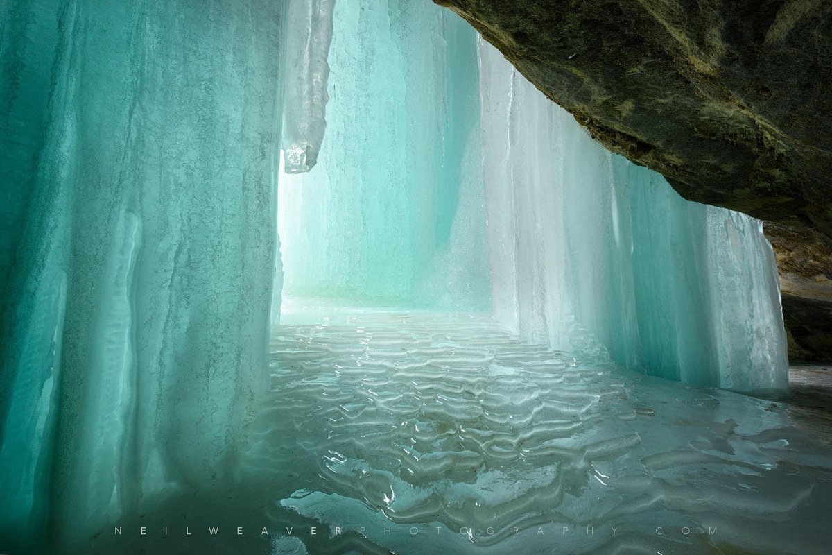 Behind the ice curtains at Pictured Rocks National Lakeshore.  
#puremichigan
