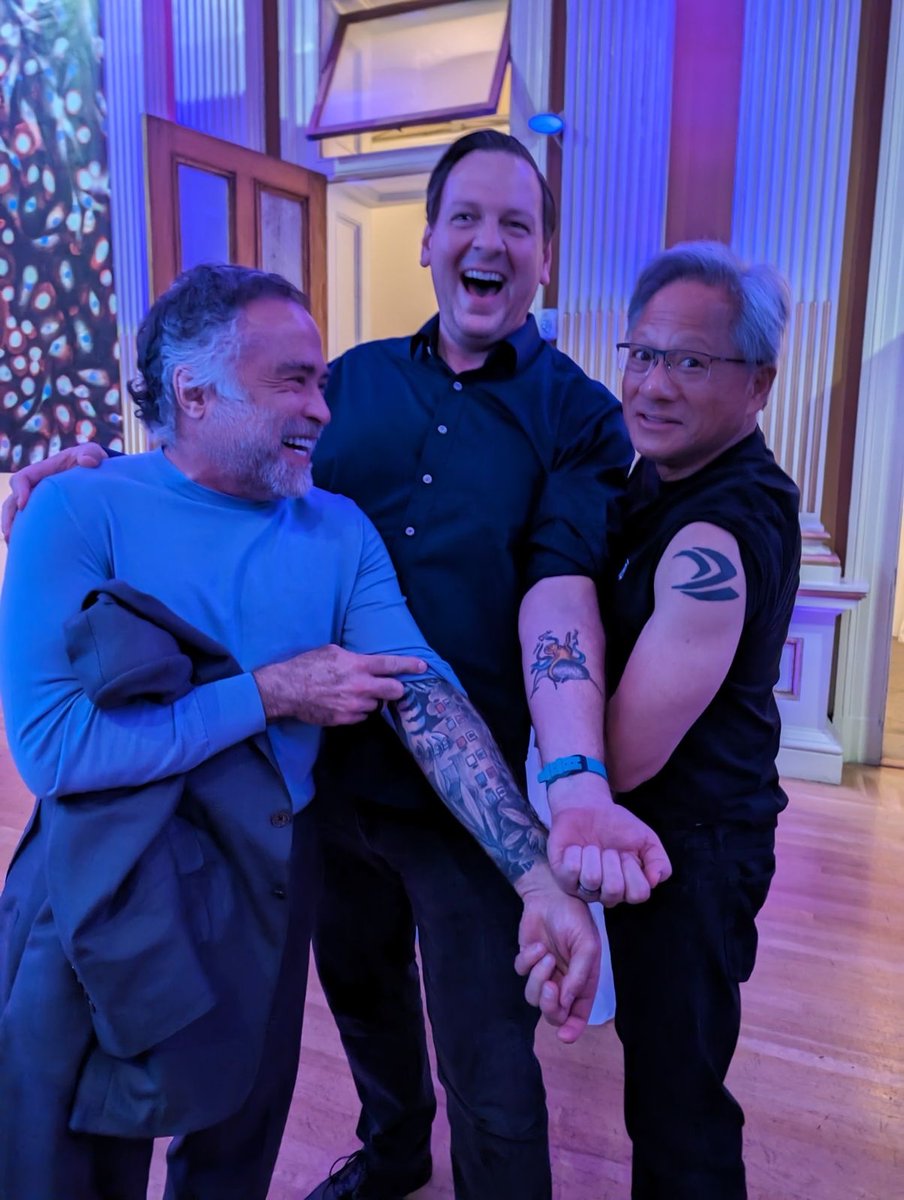 Chris Gibson (@recursionchris) on Twitter photo You have to have skin in the game!
Reflecting back on #JPM2024 last week and this shot has to be a personal highlight. I was comparing company tattoos with NVIDIA founder & CEO Jensen Huang when <a href="/RecursionPharma/">Recursion</a> Board Chair <a href="/RMartinChavez/">R. Martin Chavez</a>  dropped his full sleeve Turing machine! You have to have skin in the game!
Reflecting back on #JPM2024 last week and this shot has to be a personal highlight. I was comparing company tattoos with NVIDIA founder & CEO Jensen Huang when <a href="/RecursionPharma/">Recursion</a> Board Chair <a href="/RMartinChavez/">R. Martin Chavez</a>  dropped his full sleeve Turing machine!