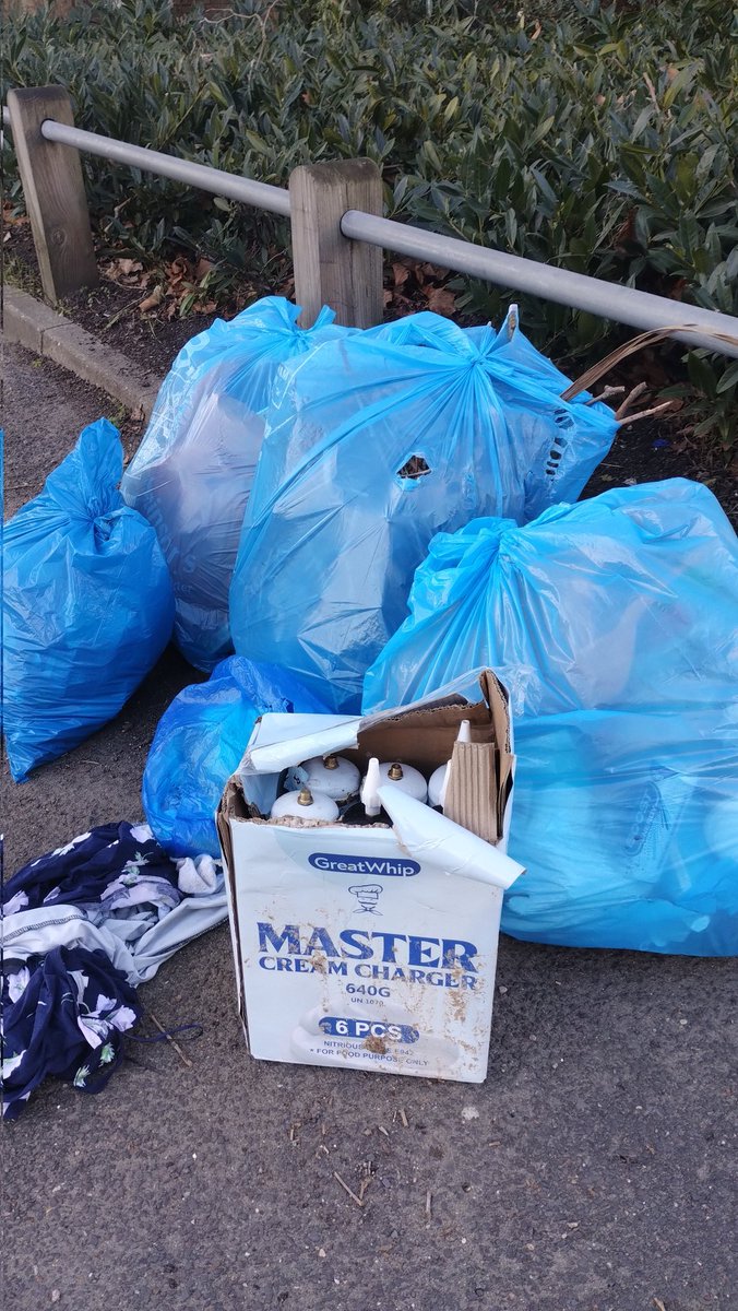 OurBellGreen's tweet photo. On Saturday, myself and my two kids collected up this box of nitrous canisters and carried it to the nearest pile of street sweeper bags. On Monday, the bags had been collected, but the box was flytipped on the pavement. Just found it in some bushes. Thanks @LewishamCouncil. https://t.co/cAS7qj7T3m
