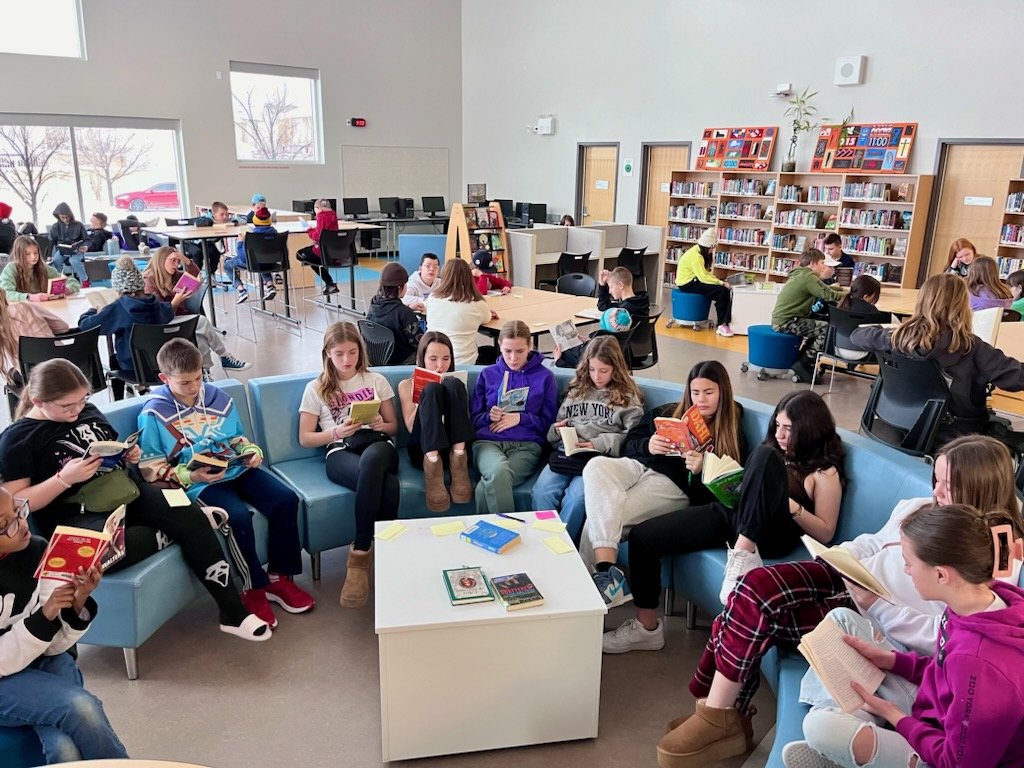 Grade 6 Book Tastings on a chilly Tuesday morning! Spending time with multiple texts to decide which one you want to dig further into is a great way to build engagement in reading!