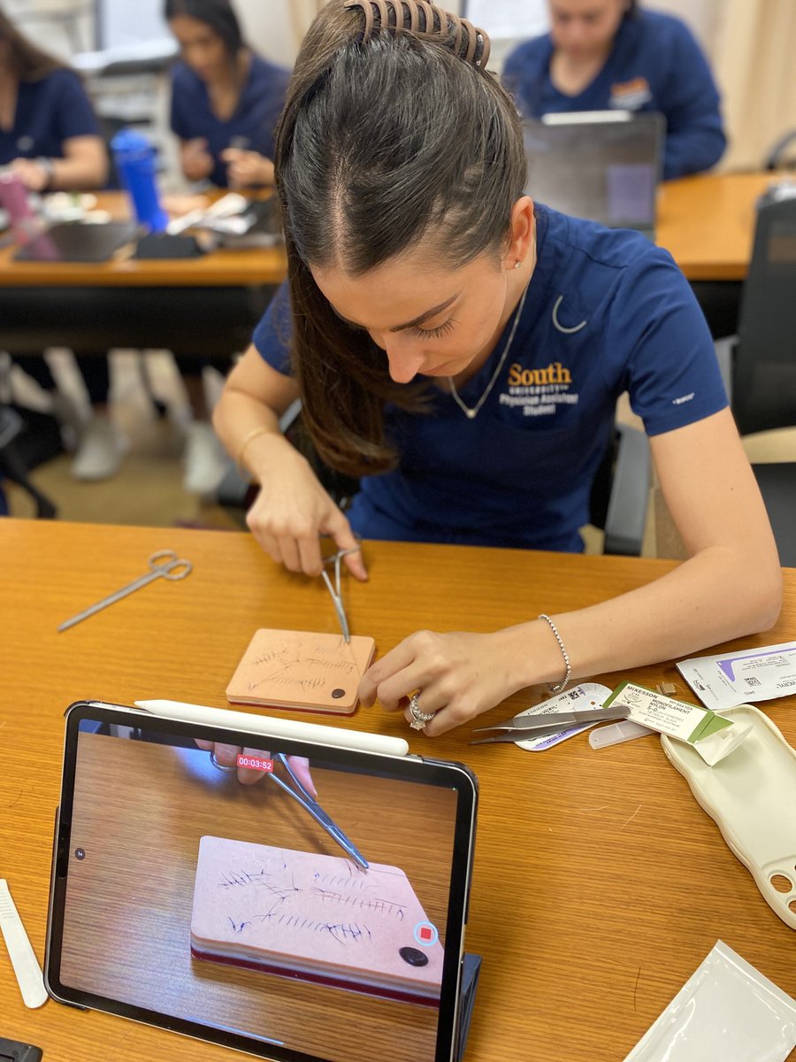 SouthU's tweet photo. 🪡 #SouthUniversity, West Palm Beach #PA students practice #suturing & stitching in class. 🥼
Interested in our PA Program? https://t.co/OTLiS5Asjs
#HandsOnLearning #PASchool #PracticeMakesPerfect #PAStudent #PhysicianAssistant #PhysicianAssociate #SuturePractice #Stitches https://t.co/IvTDoYkLbD