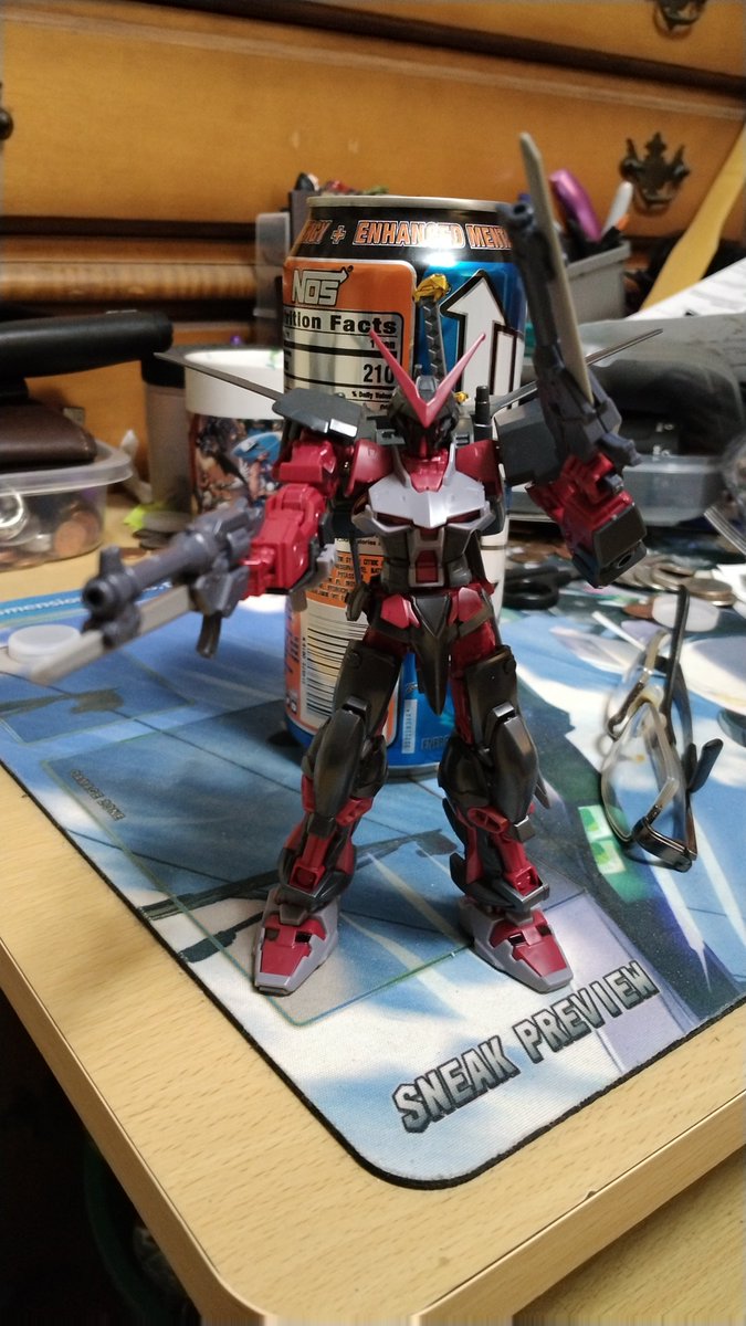 Astray red frame inversion. It's a decent hg kit but I didn't like the flight pack because it was too bulky for it. I fashioned a smaller one out of parts from an SD kit and it fits his slim frame better. I also added two built pistols from another kit. And now he looks cool.