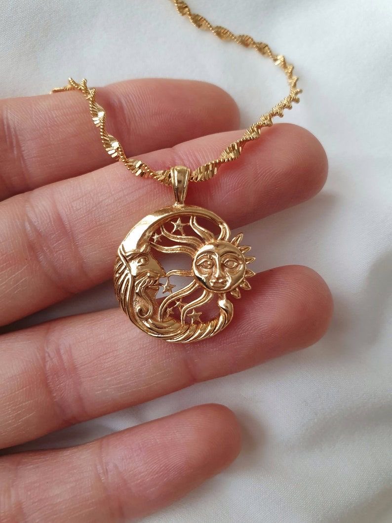 300moods's tweet photo. sun and moon necklace 🌜🌞 https://t.co/tkXwjy6Xuo