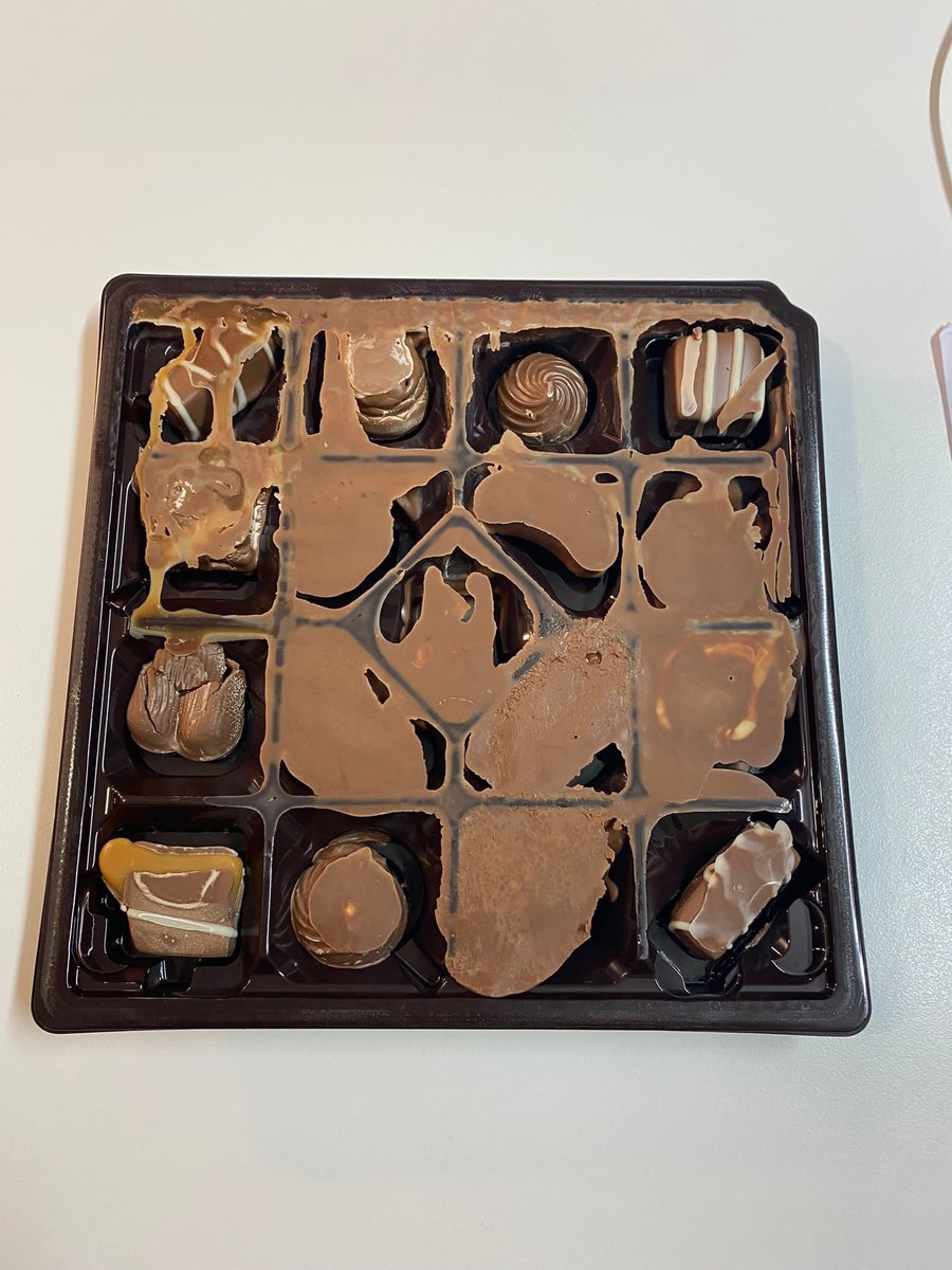 HolsRussell's tweet photo. Help @CadburyUK @sainsburys - we received a lovely box of our fave, Milk Tray today, and both layers look like this! 👀 What disaster has happened here - we were so disappointed! https://t.co/oIhTfrladD