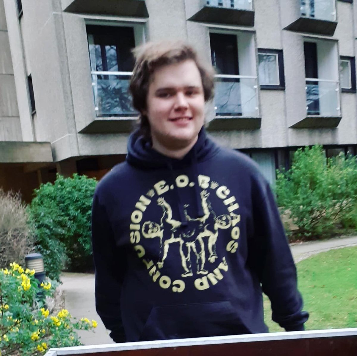 NewsfromBedlam's tweet photo. Holidays done, brainy godson Tommy is back to study at Oxford. On our website there’s a sweet photo of him modelling as Little Lord Bedlam. Tom VOLUNTARILY WEARS BECAUSE HE LOVES IT the  #ChaosandConfusion hoody, silk screen printed gold on black. Our #SuperSale Sunday to get you https://t.co/H78wwARvSq