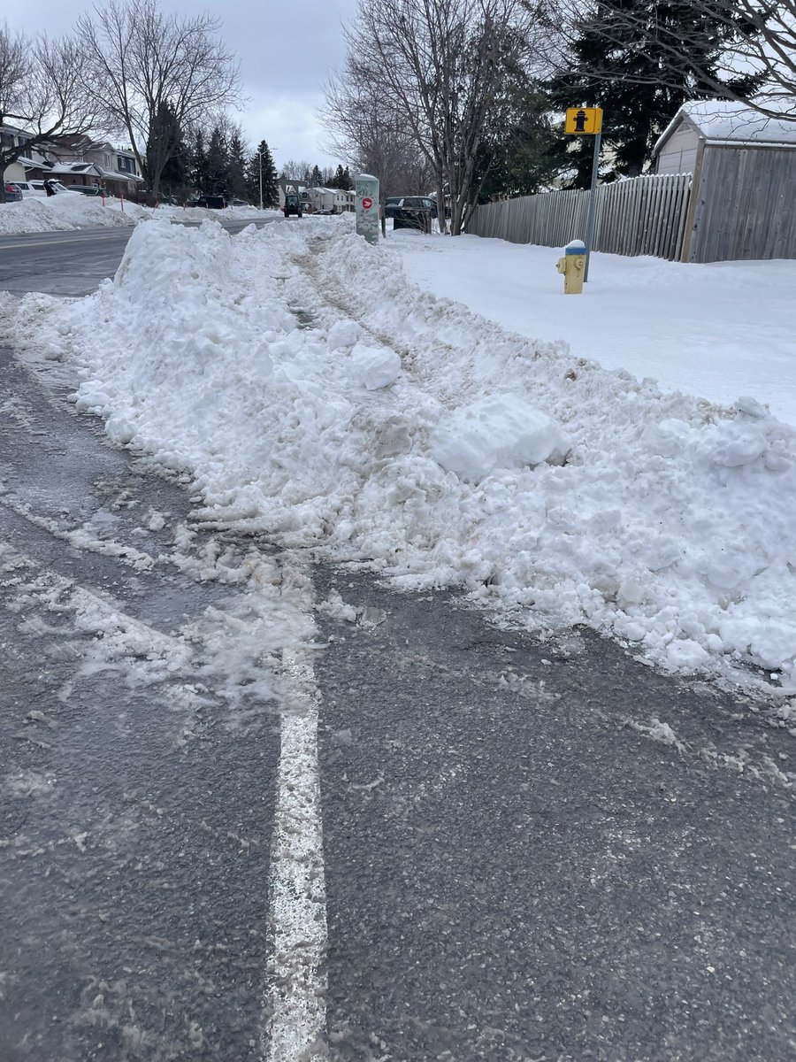 RobynHastie's tweet photo. Went out for a walk early afternoon. Those sidewalks and pathways are still a mess (and some are worse now that road plows have gone by). Took a slightly different route and submitted some more tickets. https://t.co/m03YgdmPxV