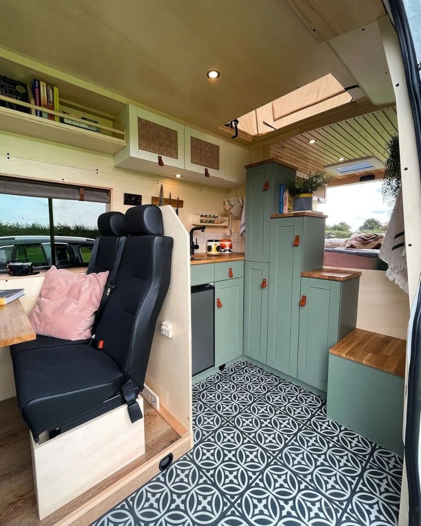 This campervan layout brings cozy to the road. The pastel cabinetry and patterned floor create a chic, welcoming interior, while clever storage solutions ensure a place for everything. 

@bearhugcampers  

#camperbuyer #vanbuilduk #ukvanconversion #vanlife #vanconversion