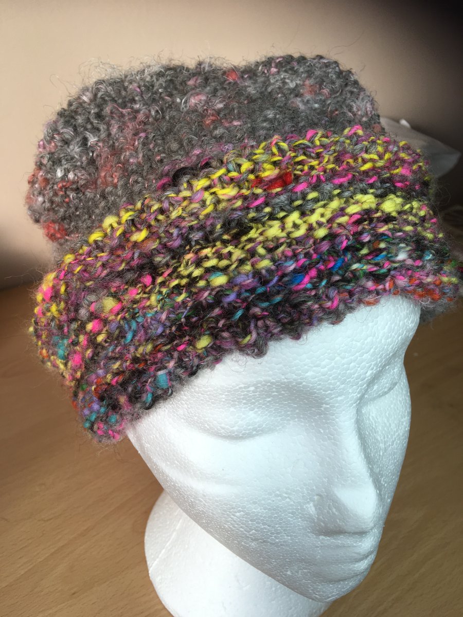 Another hat, colours chemical. Hand spun and knitted, Shetland fleece with waste silk.