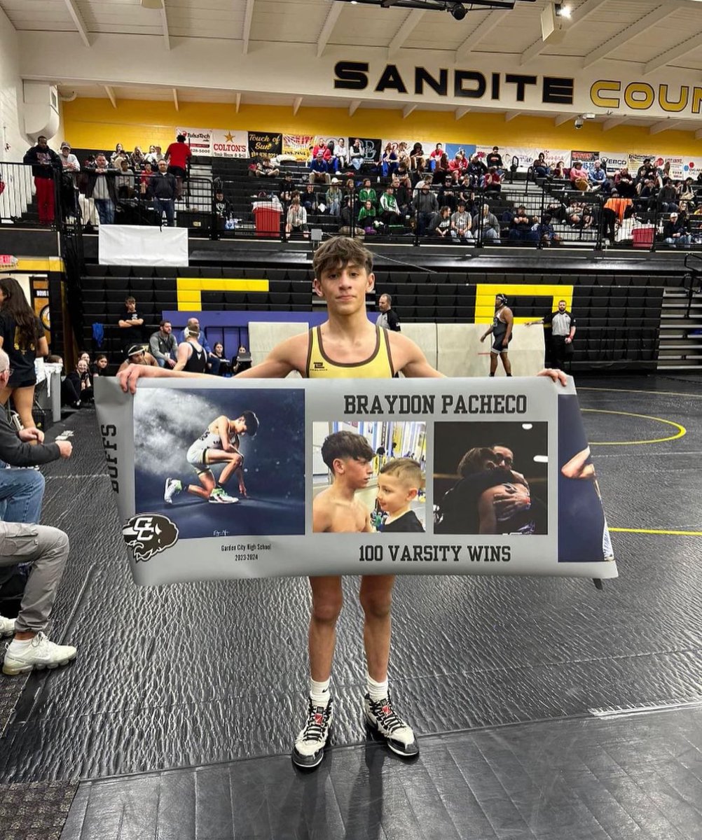 Brayden Pacheco of Garden City HS reaches 100 career wins. Only a junior and ranked #1 in 6A at 106 pounds. #sportsinkansas