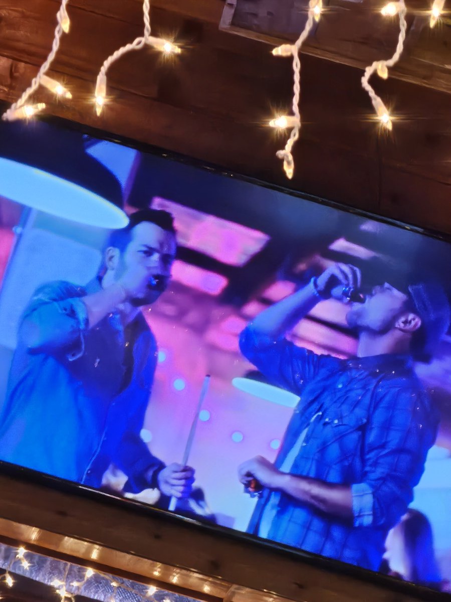 KarrisSue's tweet photo. When you're enjoying your steak at Texas Roadhouse and @JordanWalker___ and @johnny_macmusic fill the screens/speakers. What a throwback!!!! Miss yall!! ❤️ 
@walkermcguire https://t.co/R7fZfiGV0S