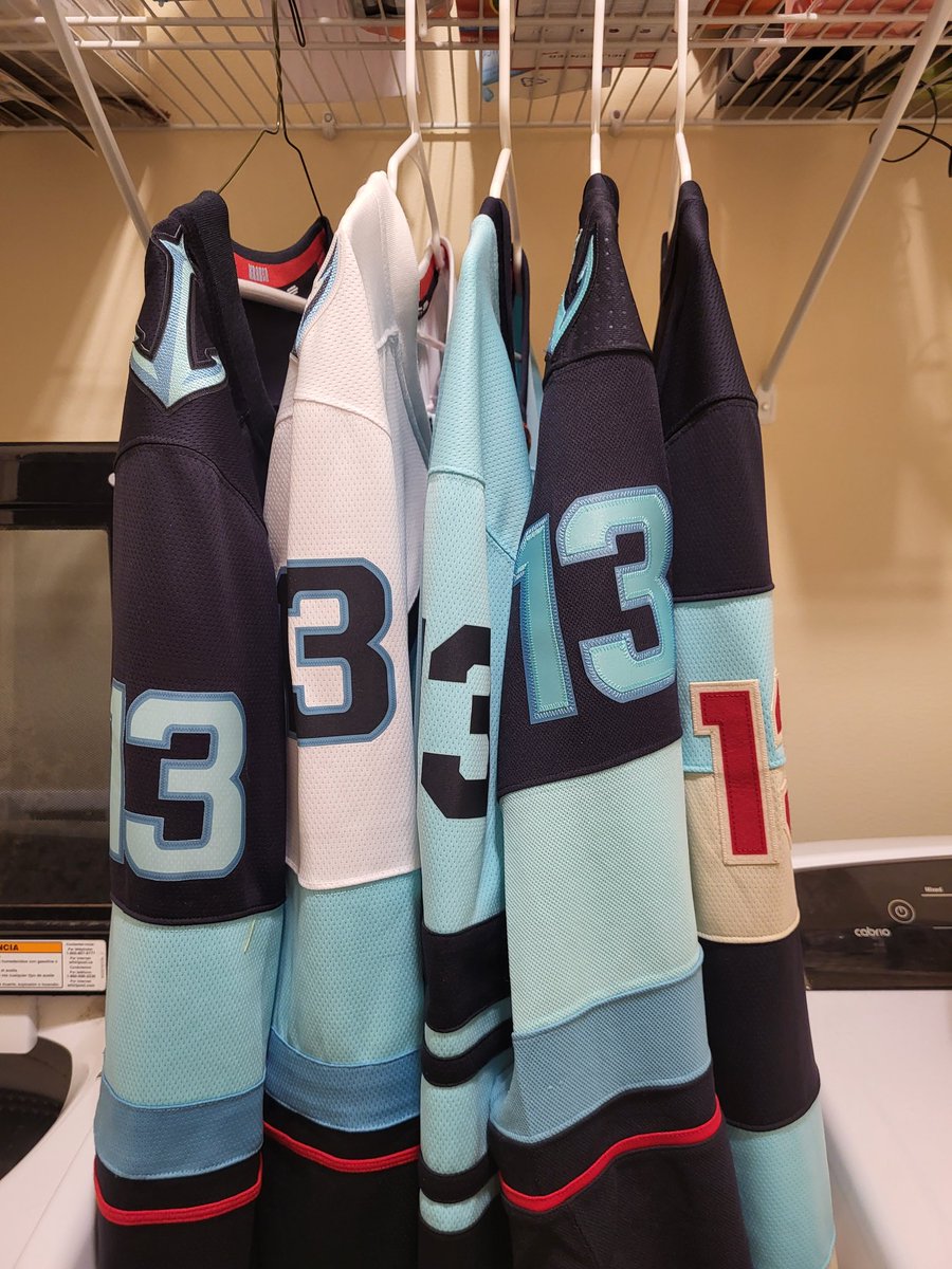 mwills1313's tweet photo. It's laundry day. Why no, I don't think I own enough @SeattleKraken sweaters. And yes, they're all Turbo sweaters. He's my favorite! #SeaKraken #ItsTurboTime #brandontanev https://t.co/DLWYSInpsD