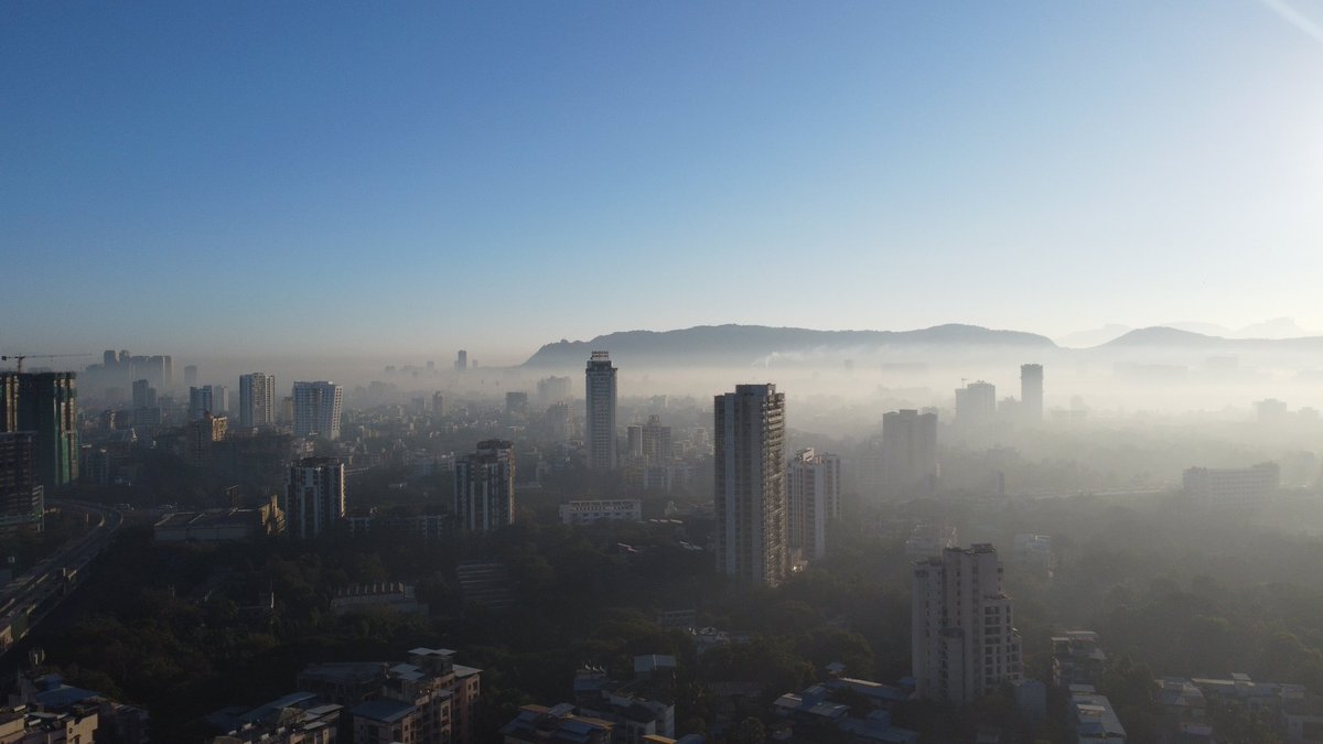 #Thane City Today, there was a drastic difference between east & west in air #AQI #smog even though it was clear sunrise, mama bhanja hills  #Mulund hill #Mumbai #SGNP #wagle #Malang gad visible in distant background