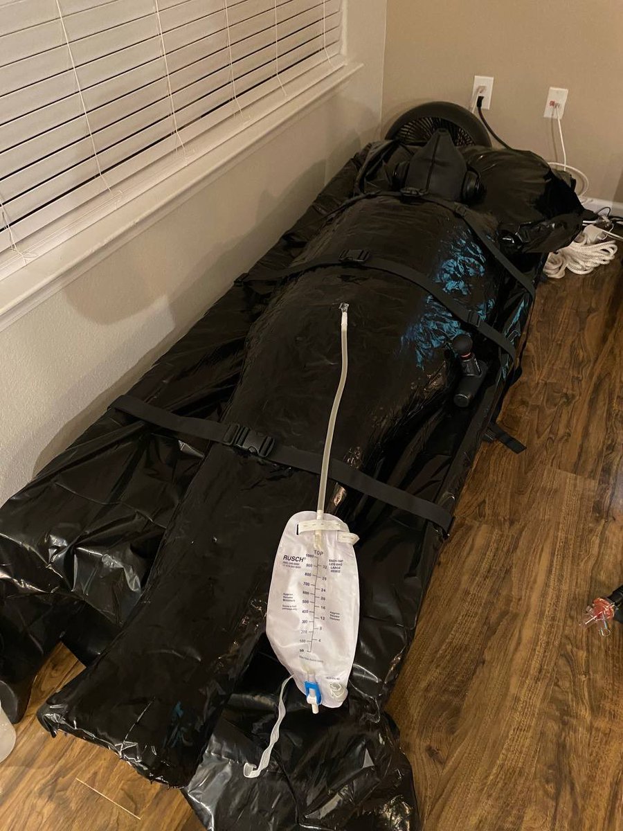 justdifferenttx's tweet photo. Part 2 - I switched up the hoods for about hour and half before securing his head with an anesthesia mask and duct tape . @gluvlover only source to the outside world was that breathing tube. 😈 #mummification https://t.co/IlHh1wwX2g