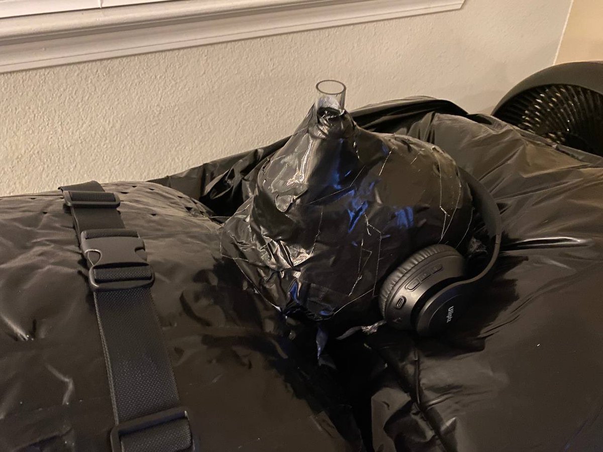 justdifferenttx's tweet photo. Part 2 - I switched up the hoods for about hour and half before securing his head with an anesthesia mask and duct tape . @gluvlover only source to the outside world was that breathing tube. 😈 #mummification https://t.co/IlHh1wwX2g
