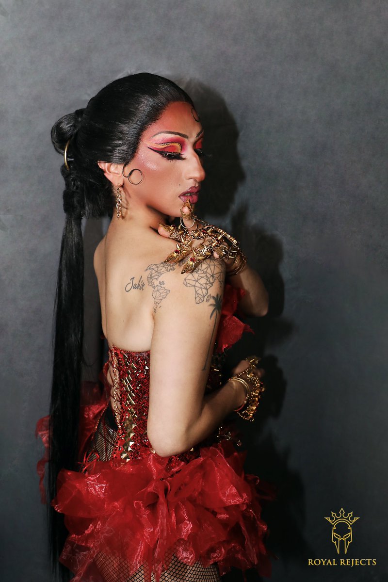 RoyalReject's tweet photo. The goddess @iamcardib as Ares in a custom red snakeskin leather corset with gold filigree butterflies and gold findings. Studded, stoned and handsewn. https://t.co/BbfBiAXNB0