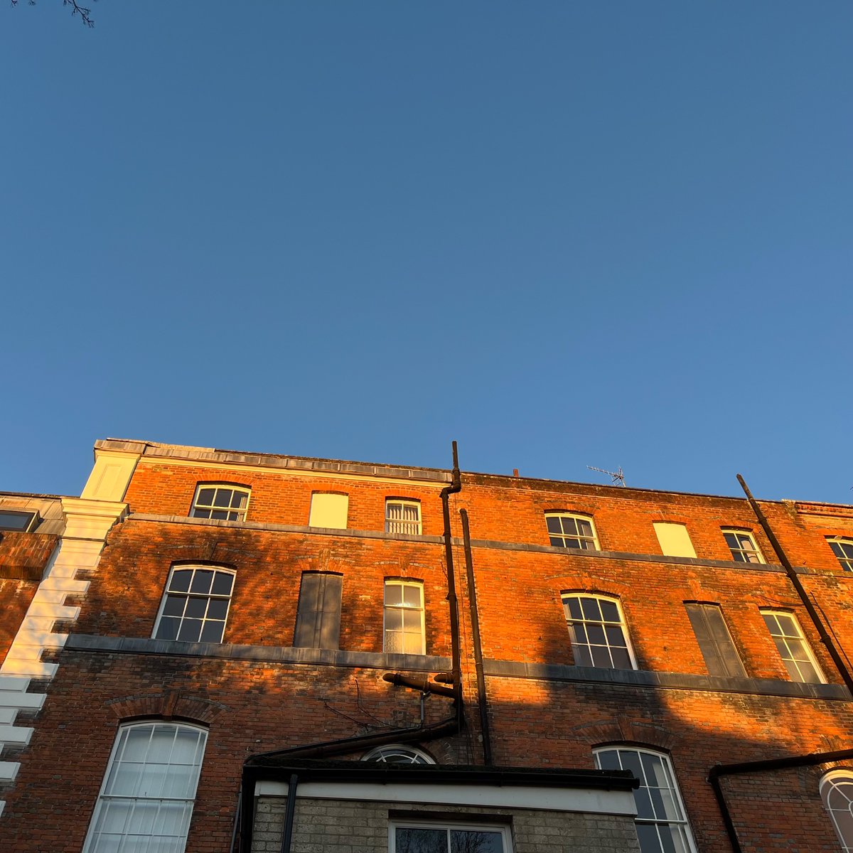 The sun rises on the east facing rear of our building at the dawn of another working week #winchester
