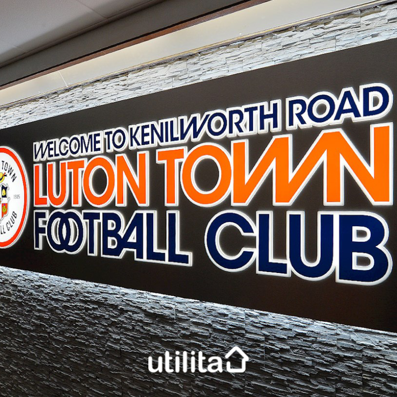 LutonTown's tweet photo. Kenilworth Road will open its doors to the public next week in a ground-breaking new community project, powered by front-of-shirt partner @UtilitaEnergy.

It will become the UK’s first football stadium to operate as a ‘Warm Hub’, inviting residents into its hospitality lounges.