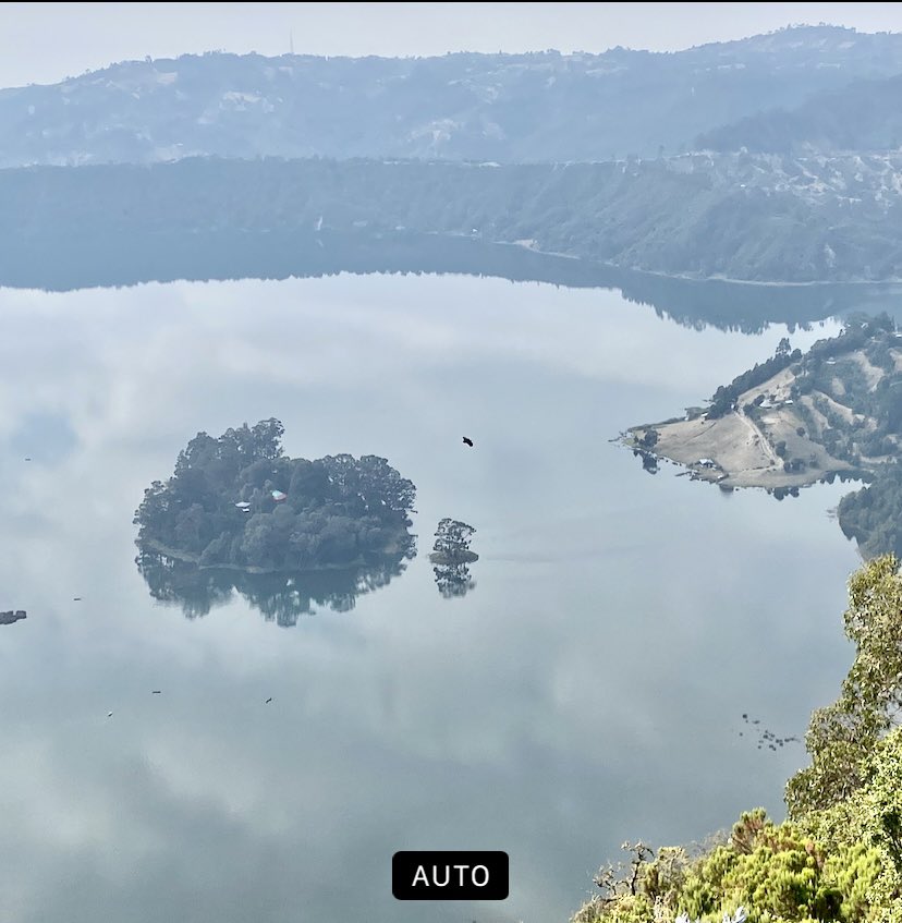 TayeAtske's tweet photo. A jewel of Nature under Ethiopian sky, Wonchi-Dandi crystal clear water, lush green grass, mountain high trees, 14th Century Church in the middle of the lake; blessed by elders deeply in love with nature and #Ethiopia  A breath taking beauty to be explored and admired. https://t.co/sCO96lM4fc