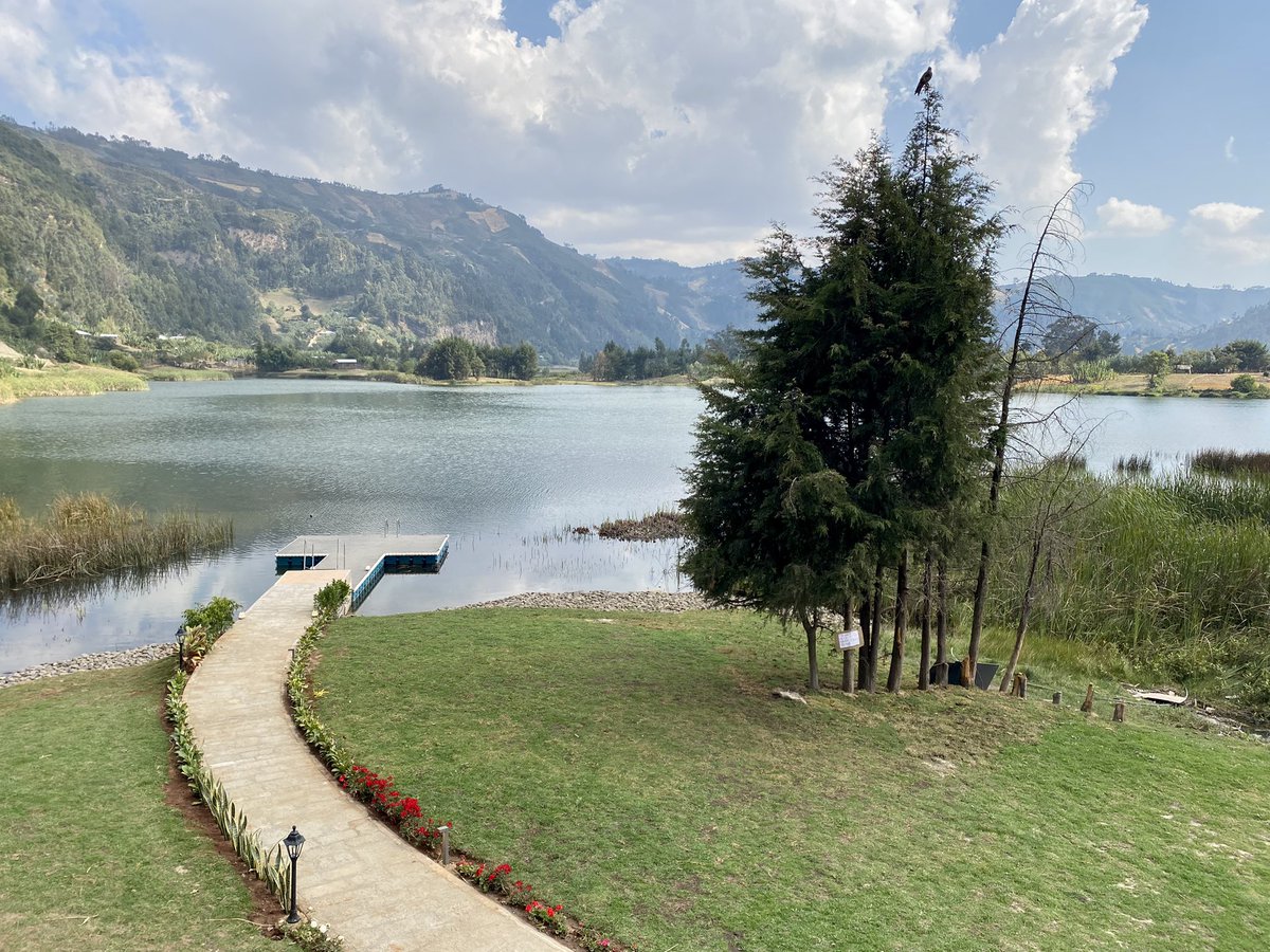 TayeAtske's tweet photo. A jewel of Nature under Ethiopian sky, Wonchi-Dandi crystal clear water, lush green grass, mountain high trees, 14th Century Church in the middle of the lake; blessed by elders deeply in love with nature and #Ethiopia  A breath taking beauty to be explored and admired. https://t.co/sCO96lM4fc