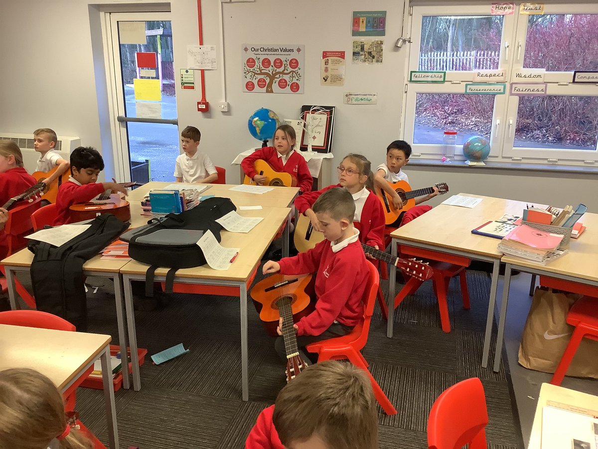 StPhilipsY4C's tweet photo. In 4ES we have been practicing different strumming patterns! @StPhilipCEAP #teamstphilips https://t.co/Bb5kMiRcvi
