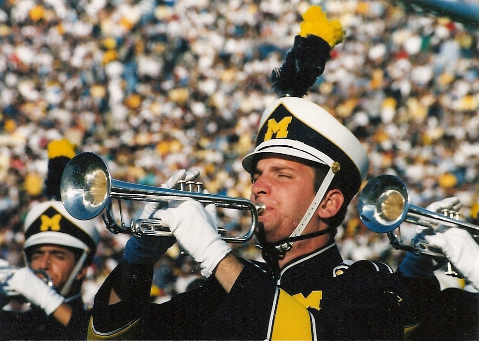 JonSchneider's tweet photo. True @UMichFootball stat: Consecutive Rose Bowl games and National Championships won when there was a Schneider in the @umichband: 2

(Myself, in my final year, in 1997; my son Eli, in his first year, in 2023!) https://t.co/z0qD4R5iwx