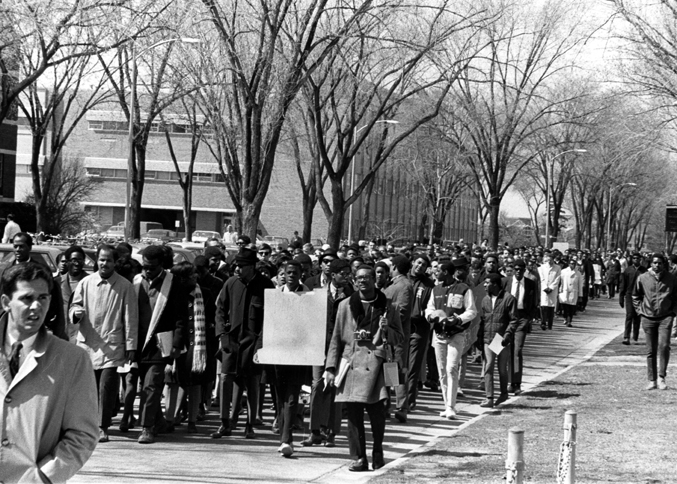 MSUArchives's tweet photo. #DYK that in honor of Dr. Martin Luther King Jr.'s passing MSU students and faculty members marched on campus on April 5, 1968? This march was led by Professor Robert L. Green and Barry Amis of the Black Student Alliance, and consisted of almost 2,000 people. #MSUHistory https://t.co/rgE2x6yTCR