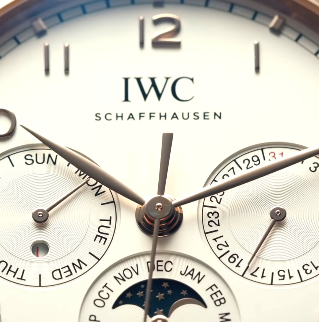 The IWC Portugieser Perpetual Calendar 42

~ Functions: Perpetual Calendar
~ Case: 42.4mm – Gold – 13.8mm Thick
~ Water Resistance: 30M
~ Movement ( Calibre 82650) 60-Hour Power Reserve – Automatic –28,800 vph Frequency – 46 Jewels
~ MSRP: £29,900