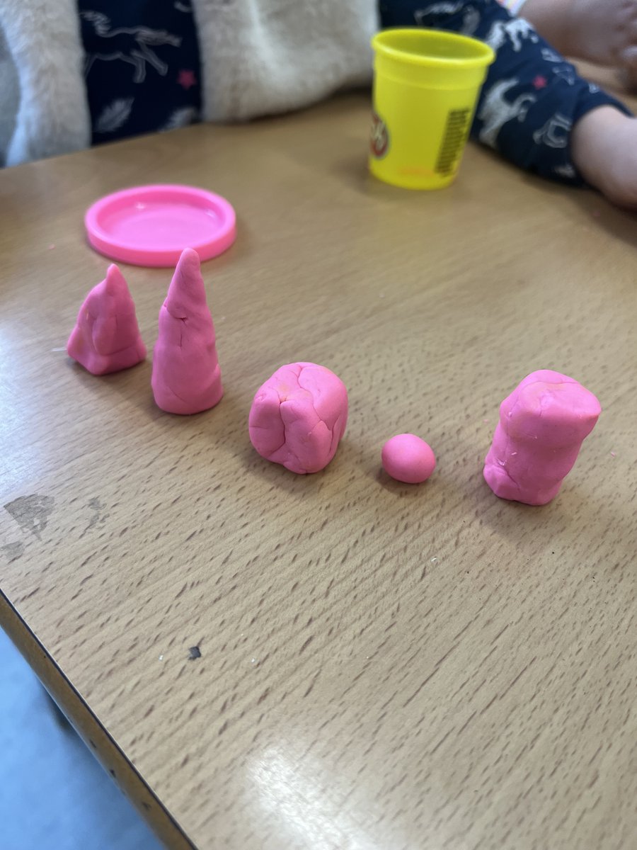 Making 3D shapes out of play dough in Maths!