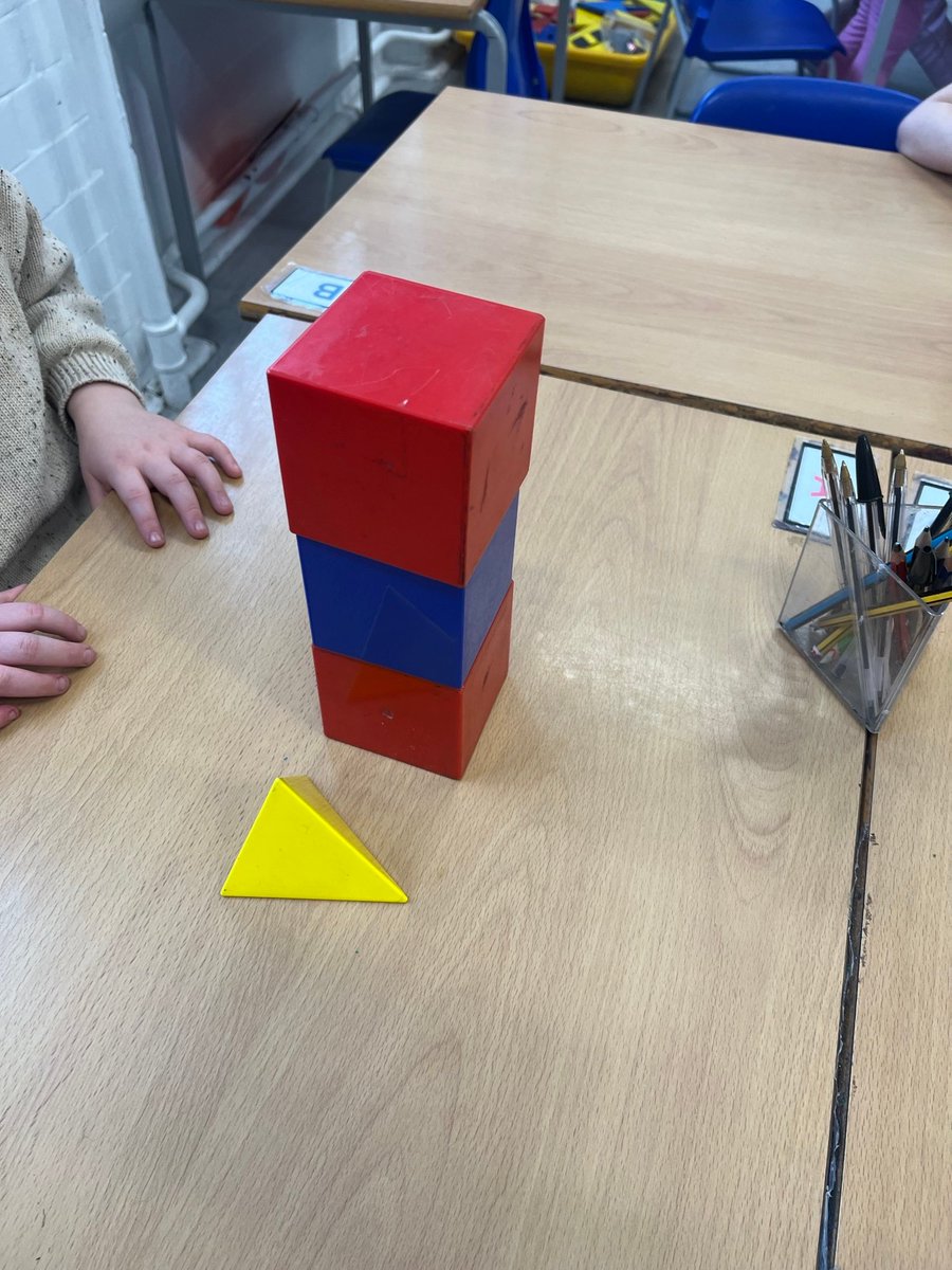 Seeing which 3D shapes we can make a tower out of and why...